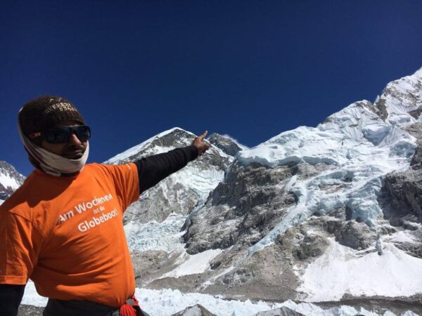 Pointing to Mt Everest